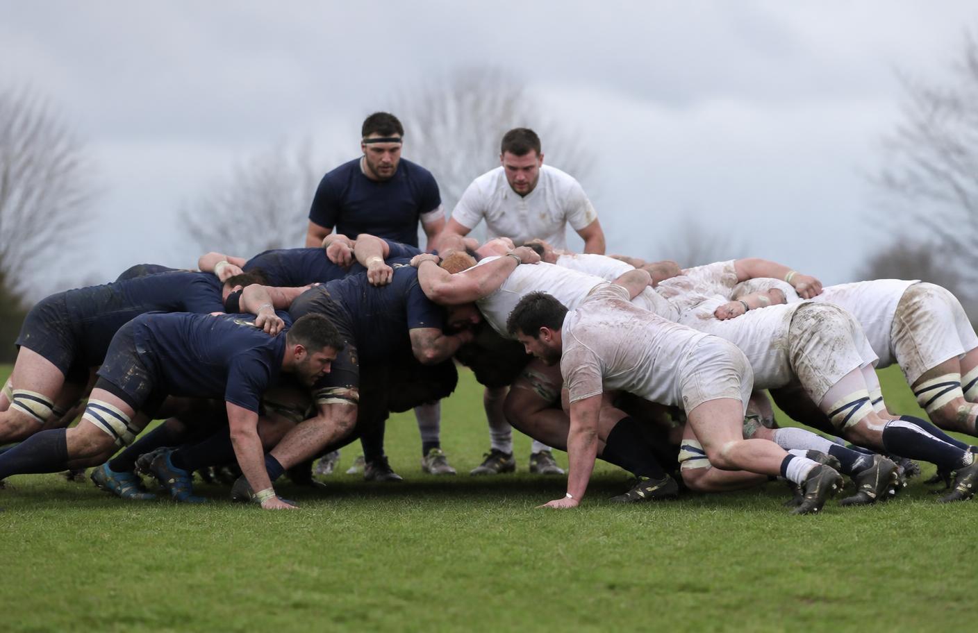 Rugby forwards packing down in a scrum